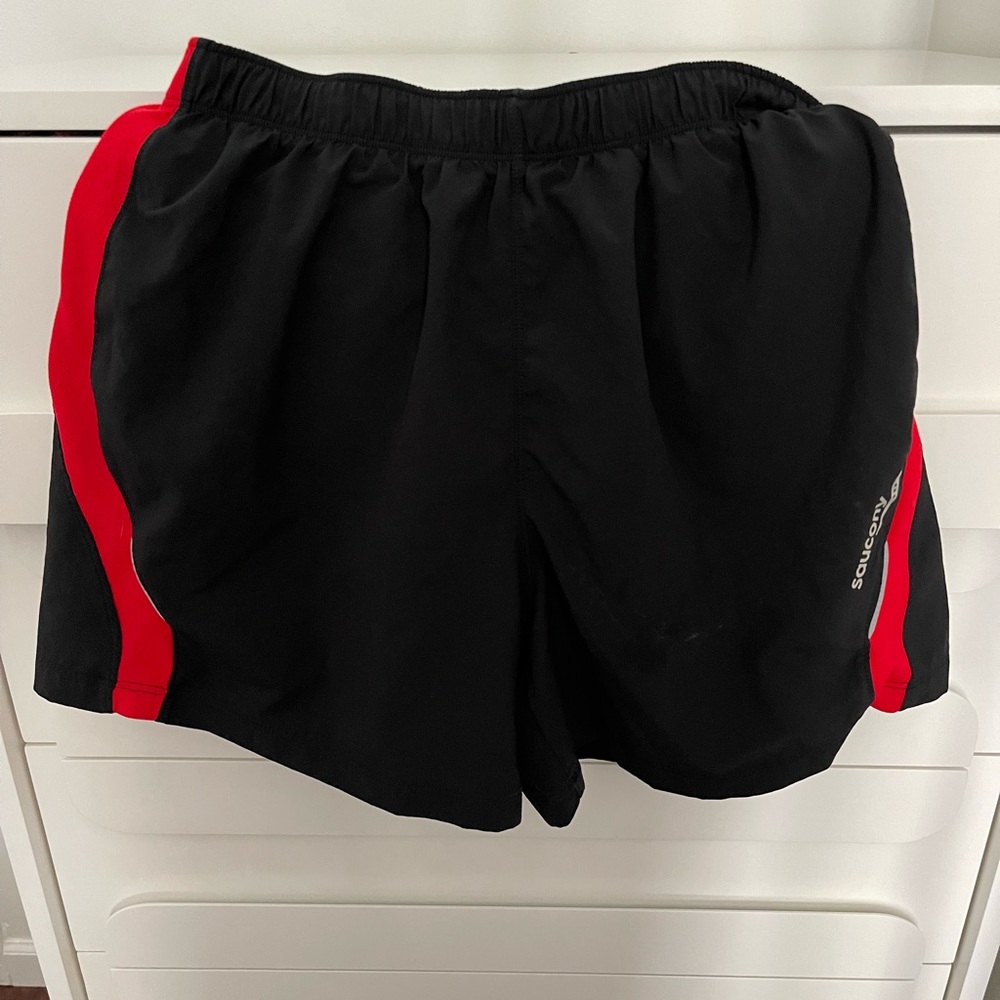 Saucony Run Dry Lux Running Shorts, black and red, Size Small.